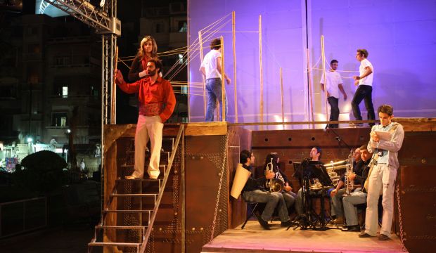 Syrian actors take part in a street performance titled 'Sanduq al-Kar' in Damascus in October, 2008. (Louai Beshara/AFP/Getty Images)