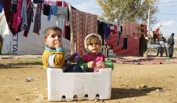 Syrian refugee children at a makeshift settlement in Qab Elias in the Beqaa valley, Lebanon, on December 8, 2014. (Reuters/Mohamed Azakir)