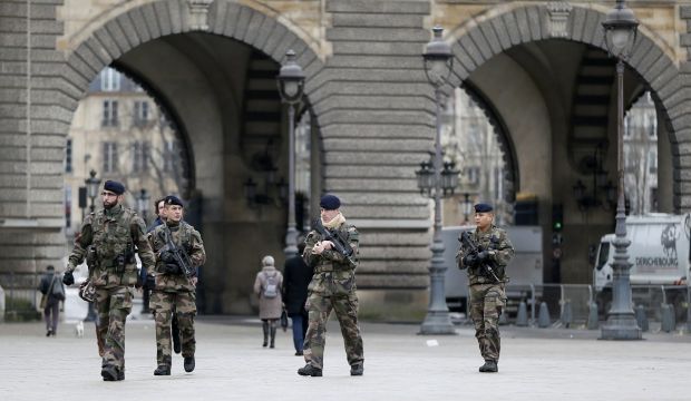 French soldiers patrol near the Louvre Museum in Paris on January 8, 2015. (Reuters/Gonzalo Fuentes)