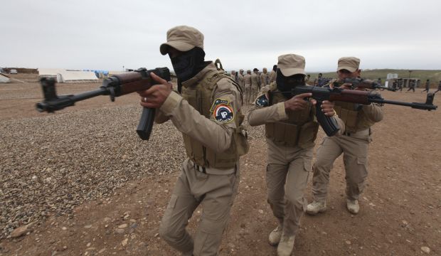 Iraqi security forces take part in training, as they prepare to fight against militants of the Islamic State of Iraq and Syria, at a training camp on the outskirts of Mosul on January 10, 2015. (Reuters/Azad Lashkari)