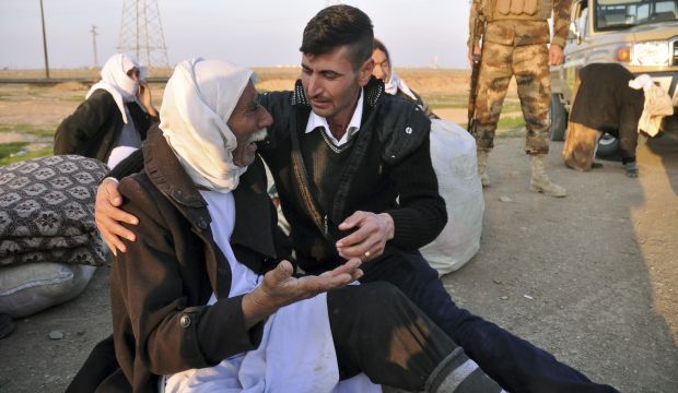An elderly Yazidi arrives in Kirkuk after being released by ISIS, on January 17, 2015 (AP Photo)