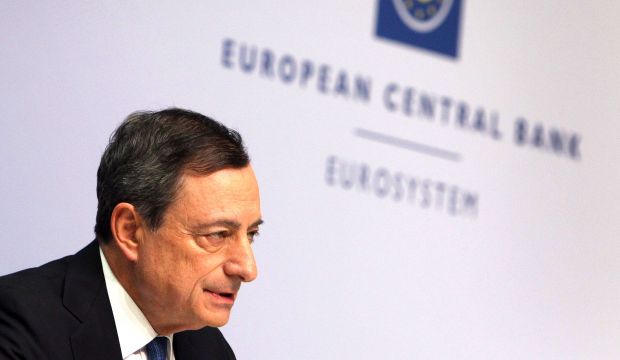 Mario Draghi, president of the European Central Bank (ECB), addresses the media during a press conference following the meeting of the Governing Council in Frankfurt am Main, western Germany, on January 22, 2015. (AFP Photo/Daniel Roland)