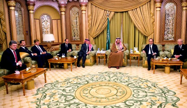 King Salman (center R), receives world leaders in Riyadh, Saudi Arabia, on January 24, 2015. (AP Photo/SPA)