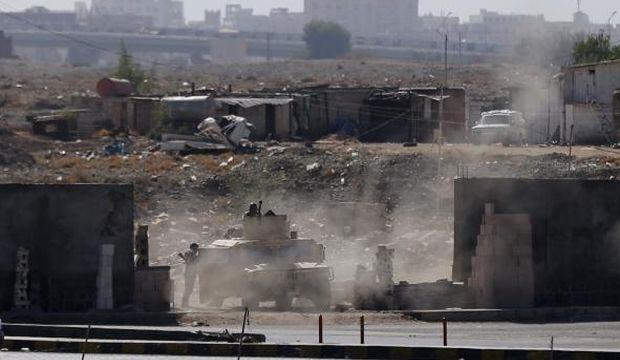 A vehicle from the Presidential Protection Forces is positioned on a street during clashes near the presidential palace in Sana’a, Yemen, on January 19, 2015. (Reuters/Khaled Abdullah)
