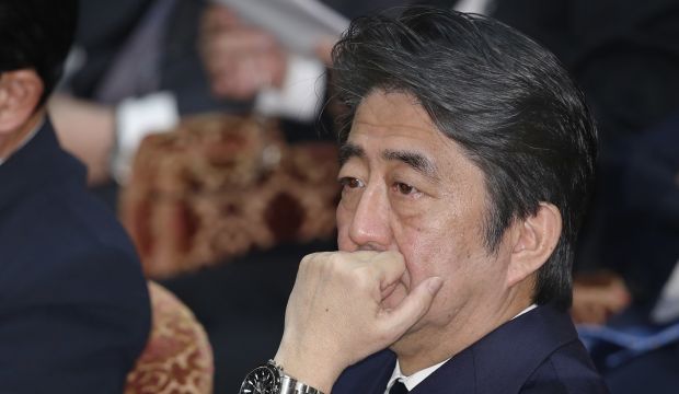 Japan's Prime Minister Shinzo Abe is working to secure release of Japanese journalist held by ISIS before deadline expires on January 29, 2015. (AP Photo/Shizuo Kambayashi)
