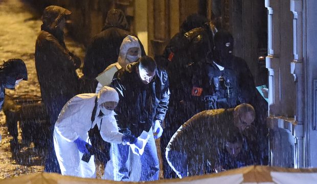 Forensic police work at the site of the deadly raid in Verviers, Belgium, on January 15, 2015. (AFP Photo/John Thys)