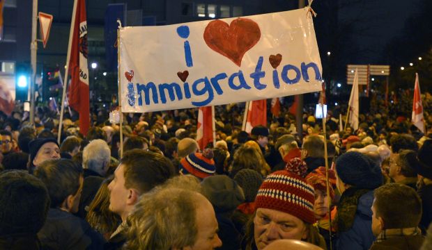 Thousands of people demonstrate against a rally called by anti-Islam group PEGIDA in Cologne, Germany, on January 5, 2015. (AP Photo/Martin Meissner)