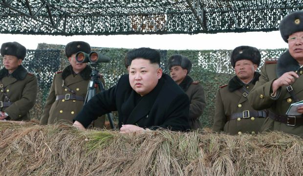 North Korean leader Kim Jong-un observes the military's river crossing training at an unknown location in North Korea. (EPA/Rodong Sinmun) 