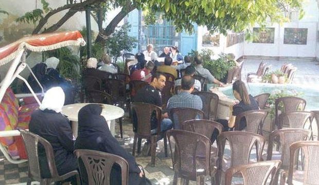 Damascus residents gather at the cultural center in the Old City. (Asharq Al-Awsat)