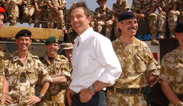 Former British prime minister Tony Blair meets with troops in Basra, Iraq, on May 29, 2003. (AFP Photo/Pool/Stefan Rousseau)