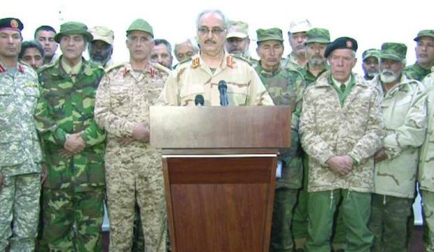 Libya’s Gen. Khalifa Haftar (Front-C) speaks during a televised press conference in eastern Libya, on February 21, 2015. (Asharq Al-Awsat)