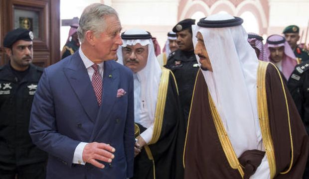 In this photo provided by the Saudi Press Agency, Britain's Prince Charles (L) walks with Saudi Arabia’s King Salman Bin Abdulaziz at the Al-Ergah Palace, in Riyadh, Saudi Arabia, on February 10, 2015. (AP Photo/SPA)