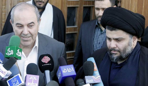 Iyad Allawi (L), Iraq’s vice president and head of the secular Iraqiya coalition, speaks during a joint news conference with Shi'ite cleric Moqtada Al-Sadr in Najaf, Iraq, on March 3, 2011. (Reuters/Ali Abu Shish)