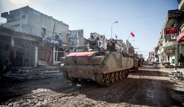 Turkish tanks return to Turkey from the tomb of Suleyman Shah, Kobani, Syria, on February 21, 2015. (EPA/Mursel Coban/Depo Photos)