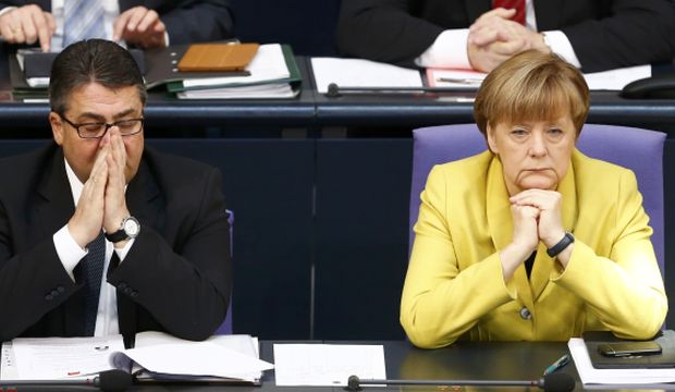 German Chancellor Angela Merkel and Economy Minister Sigmar Gabriel attend a session of the Bundestag, the lower house of parliament, in Berlin on February 27, 2015. (Reuters/Hannibal Hanschke)