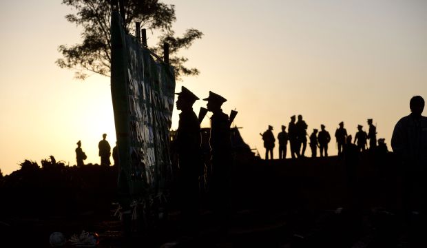 Soldiers in the Taang National Liberation Army, an ethnic insurgency group in northern Shan state, Myanmar, take part in celebrations marking the 52nd anniversary of their insurrection on January 12, 2015. (AP Photo/Gemunu Amarasinghe)