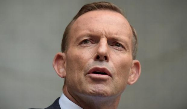 Australian Prime Minister Tony Abbott speaks to the media during a press conference at Parliament House in Canberra, Australia, on February 9, 2015. (EPA)