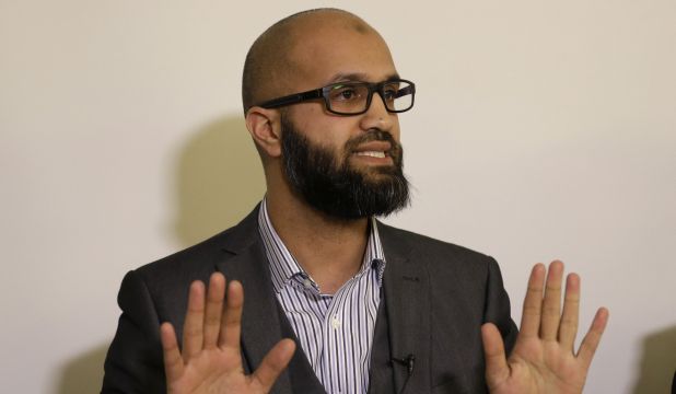 CAGE research director Asim Qureshi talks during a press conference held by the CAGE human rights charity in London, on February 26, 2015. (AP Photo/Matt Dunham)