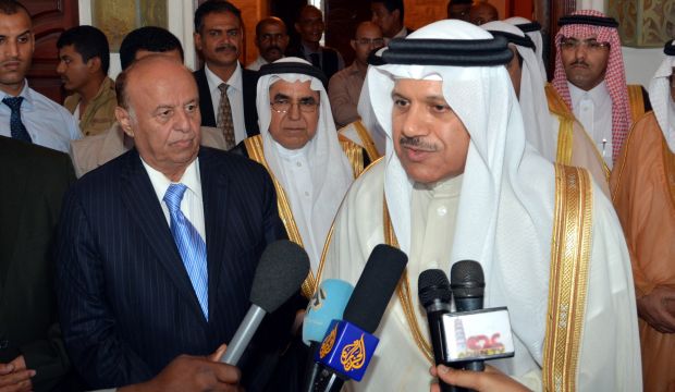 Secretary General of the GCC Abdullatif Al-Zayani (R) speaks to media after meeting with Yemeni President Abd Rabbuh Mansur Hadi (L) in the Presidential Palace in Aden, Yemen, on February 25, 2015. (EPA/Stringer)