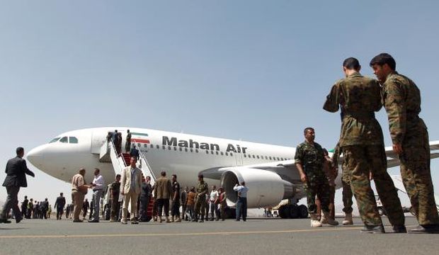 An airplane of Iranian private airline Mahan Air sits at the tarmac after landing at Sana’a International Airport in the Yemeni capital on March 1, 2015, a day after officials from the Shiite militia-controlled city signed an aviation agreement with Tehran. (AFP Photo/Mohammed Huwais)