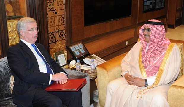 Saudi Deputy Crown Prince, Second Deputy Prime Minister and Minister of Interior Prince Muhammad Bin Naif (R) speaks with Britain’s Defence Secretary Michael Fallon at the Royal Palace in Riyadh, Saudi Arabia, on March 3, 2015. (Saudi Press Agency)
