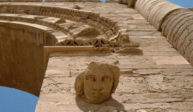 In this July 27, 2005 file photo, the face of a woman stares down at visitors in the Hatra ruins, 200 miles (320 kilometers) north of Baghdad, Iraq. (AP Photo)