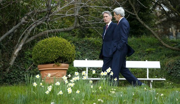 US Secretary of State John Kerry (R) talks to British Foreign Secretary Philip Hammond in the Olympic Garden in a break during Iran nuclear program talks in Lausanne, Switzerland, on March 30, 2015. (Reuters/Ruben Sprich)
