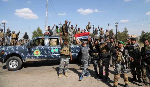 Iraqi security forces prepare to attack ISIS positions in Tikrit, Iraq, on March 26, 2015. (AP Photo/Khalid Mohammed)