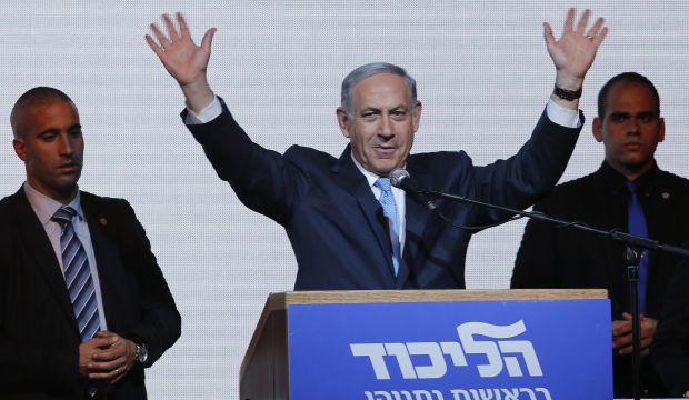 Israeli Prime Minister Benjamin Netanyahu waves to supporters as he delivers a speech in Tel Aviv, Israel, on March 18, 2015. (EPA/Abir Sultan)