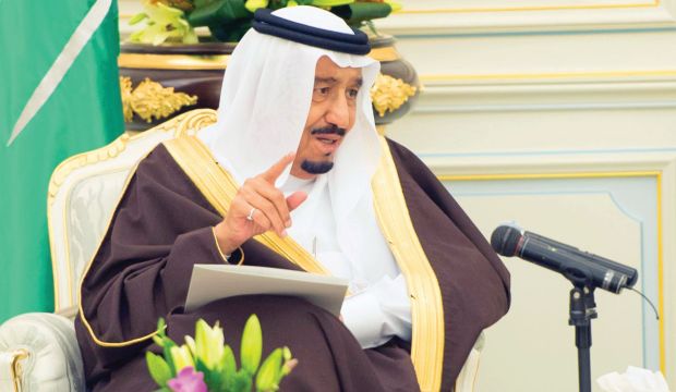 Saudi King Salman Bin Abdulaziz Al Saud gestures during a meeting with senior judicial officials in Riyadh on March 24, 2015. (SPA)