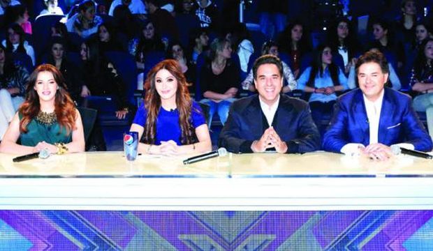 X Factor judges Dina Samir Ghanem (L), Elissa (2nd-L), PR manager Mazen Hayek  (2nd-R) and judge Ragheb Alama (R). 