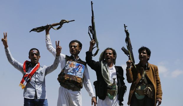 Supporters of Ahmed Ali Abdullah Saleh, the son of Yemen's former President Ali Abdullah Saleh, raise their rifles as they demonstrate in Sana'a, on March 10, 2015. (Reuters/Khaled Abdullah)