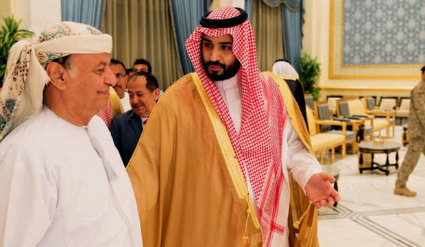 In this Thursday, March 26, 2015 file photo, provided by the Saudi Press Agency (SPA), Yemen's President Abd Rabbuh Mansur Hadi (L) walks with Saudi Defense Minister Prince Mohammed Bin Salman as Hadi arrives in Riyadh, Saudi Arabia. (AP Photo/SPA, File)