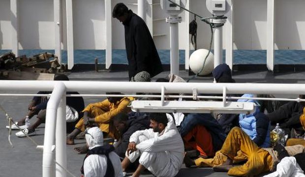 Surviving immigrants lie on the deck of the Italian coastguard ship “Bruno Gregoretti” in Senglea, in Valletta's Grand Harbor, Malta, on April 20, 2015. (Reuters/Darrin Zammit Lupi)