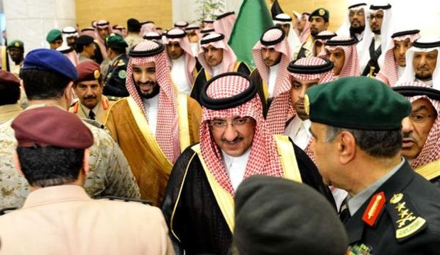 A handout picture taken and released by the Saudi Press Agency (SPA) on April 29, 2015 at a royal palace in Riyadh shows Saudi well-wishers greeting the newly appointed Crown Prince Mohammed Bin Naif (C) and new Deputy Crown Prince Mohammed Bin Salman (C-L) during a traditional pledge of allegiance ceremony. (AFP Photo/SPA/HO) 