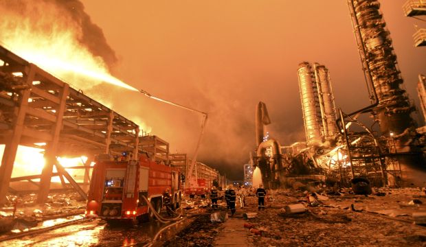 Firefighters try to extinguish a fire at a petrochemical plant in Zhangzhou, China, on April 7, 2015. (Reuters/Stringer)