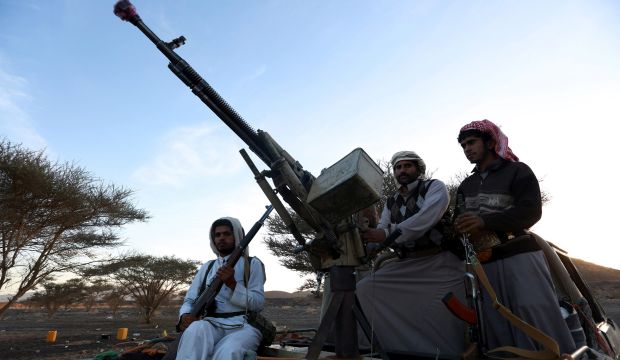 This January 23, 2015 file photo shows tribal gunmen holding weapons apparently to protect their province from possible attacks by Shi'ite Houthi militias, in the oil-rich Yemeni province of Marib. (EPA/Mohammed Ali)