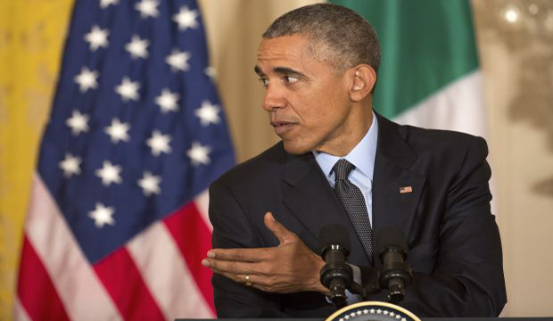 President Barack Obama participates in a joint news conference with Italian Prime Minister Matteo Renzi in the East Room of the White House in Washington, Friday, April 17, 2015.  (AP Photo/J. David Ake)