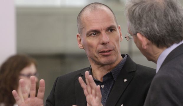 epa04719033 Greek Finance Minister Yanis Varoufakis (L) and Deputy Governor of the Bank of England for Financial Stability Jonathan Stephen Cunliffe after family photo at Informal Meeting of Ministers for Economic and Financial Affairs (ECOFIN) in Riga, Latvia 24 April 2015.  (EPA)