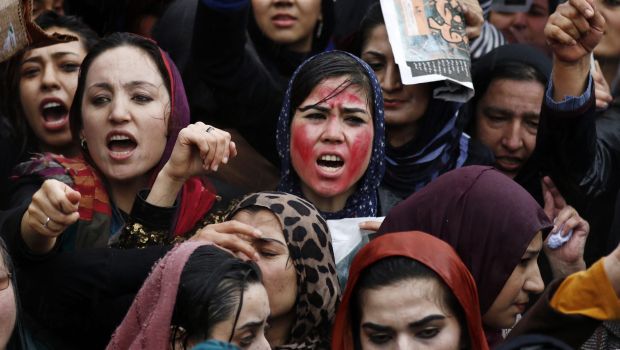 Afghan women shout slogans during a protest against the killing of Afghan woman Farkhunda, in front of the Supreme Court in Kabul, Afghanistan, on March 24, 2015. (EPA/Hedayatullah Amid)