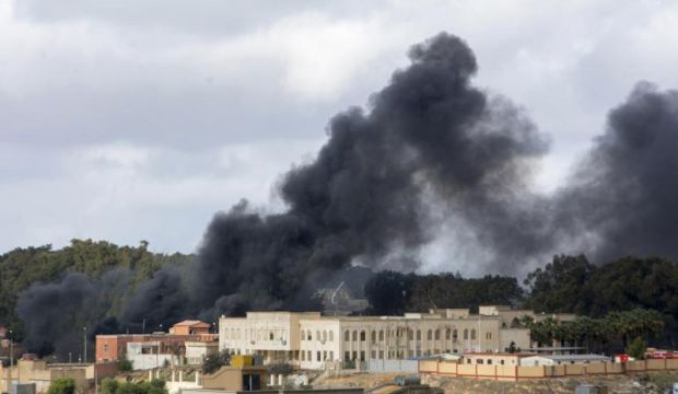This 2014 file photo shows smoke billowing from buildings in Derna, after the Libyan Air Force launched airstrikes against Islamic State of Iraq and Syria (ISIS) positions in the eastern city. (AFP Photo)