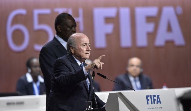 FIFA President Sepp Blatter gestures as he speaks after being re-elected following a vote to decide on the FIFA presidency in Zurich on May 29, 2015.   (AFP/Micheal Bulhozer)