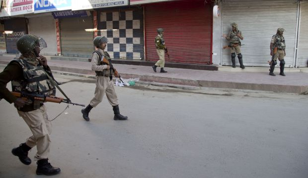 Indian paramilitary soldiers patrol a closed market area in Srinagar, Indian controlled Kashmir, on May 21, 2015. (AP Photo/Dar Yasin)