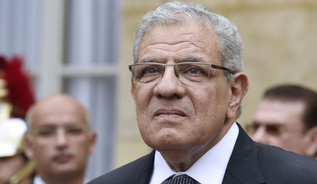 Egyptian Prime Minister Ibrahim Mahlab arrives for a meeting with his French counterpart at the prime minister's office in Paris on May 13, 2015. (AFP/Dominique Faget)