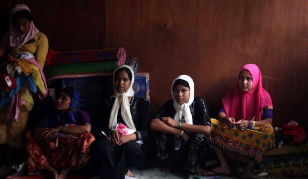 Rohingya and Bangladeshi migrants at a temporary shelter in Bayeun village, Aceh province, Indonesia, on May 23, 2015. (EPA/Dedi Sahputra)