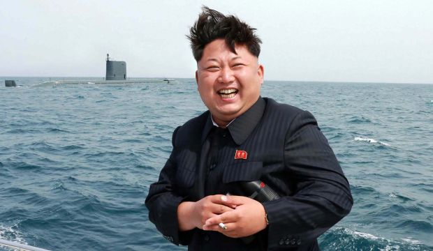 In this undated picture released by North Korea's state news agency on May 9, 2015 North Korea leader Kim Jong-Un smiles while observing a test-fire of a submarine-launched ballistic missile at an undisclosed location. (AFP photo/KCNA via KNS)