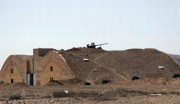 This picture released on Thursday, May 21, 2015 by the website of Islamic State militants, shows a bunker with a heavy machine gun mounted on its top at Palmyra air base that was captured by the Islamic State militants after a battle with the Syrian government forces in Palmyra, Syria.  (The website of Islamic State militants via AP)