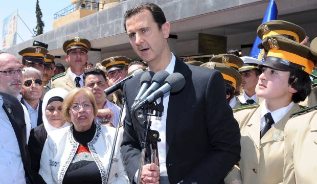 President Bashar Al-Assad addresses his supporters at a school in an undisclosed location during an event to commemorate Syria's Martyrs' Day on May 6, 2015 in this handout provided by the state news agency. (Reuters/SANA/Handout via Reuters)