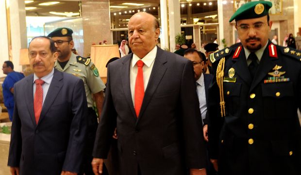Yemen's exiled President Abd Rabbuh Mansur Hadi (C) arrives for the opening of the Riyadh conference on Yemen in the Saudi capital on May 17, 2015. (AFP Photo/Fayez Nureldine)