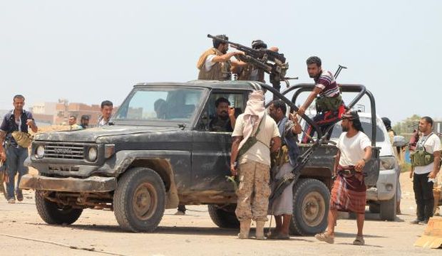 Yemeni members of the southern secessionist movement Al-Hirak gather around an armed pickup truck in Aden's suburbs, in Yemen, on June 3, 2015. (AFP Photo/Saleh Al-Obeidi)